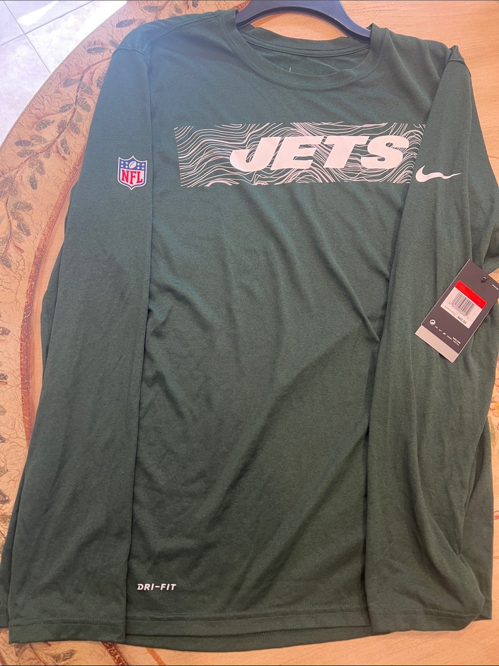 Nike Mens Jets Long-Sleeve Dri-FIT Shirt - Dark Green/White. Size L